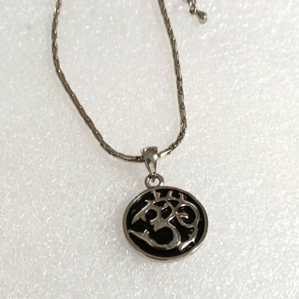 Silver Tone Om Pendant Necklace.